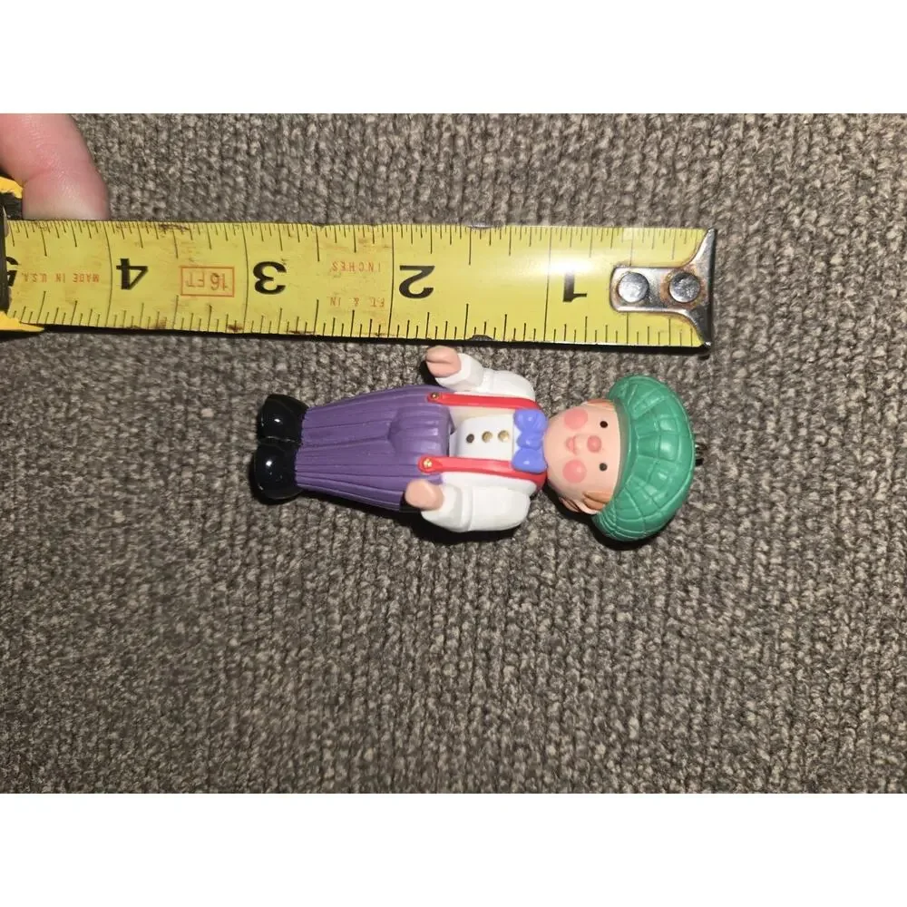 1998 Hallmark Miniature Christmas Ornament Boy Green Hat Purple Pants 2.5